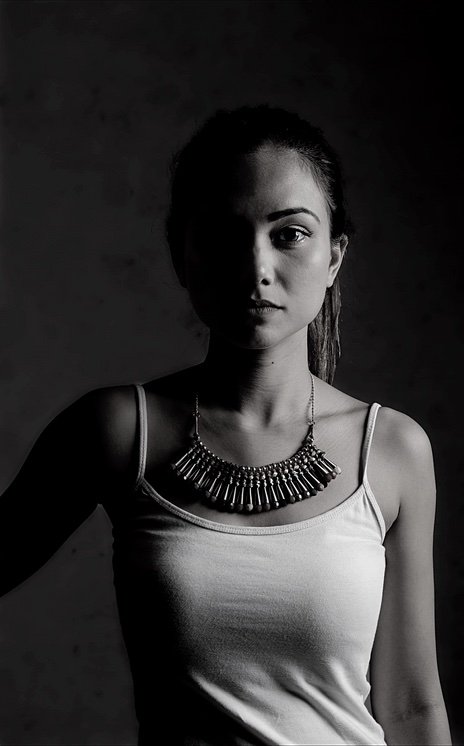 Studio portrait of Taz Angullia